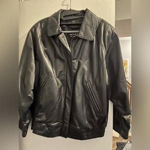 Women’s black leather jacket.